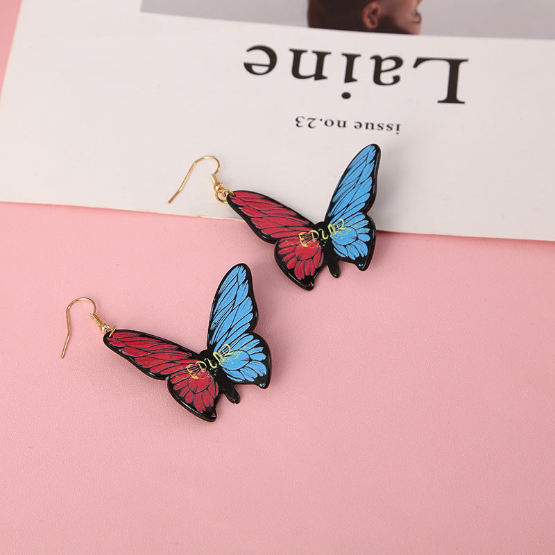 Pendientes estereoscópicos acrílicos de mariposa al por mayor pendientes coloridos